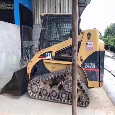 42kw Caterpillar CAT 247B chargeur à direction par glissement avec autre pompe hydraulique au Japon