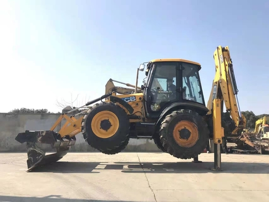 JCB 4CX, chargeuse à remontage à prix abordable, du Japon, avec une bonne capacité de seau