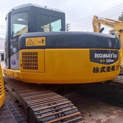 Excavateur Komatsu PC128US d'occasion en excellent état couleur originale pour la construction