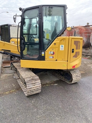 Excavateur à rouleaux Cat 306 d'occasion avec une capacité de 0,22 m3 en bon état