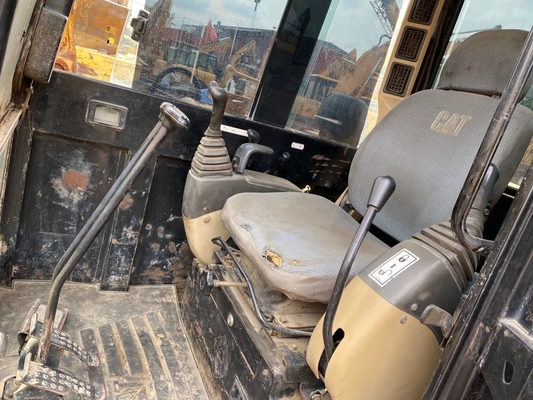 Excavateur à rouleaux Cat 306 d'occasion avec une capacité de 0,22 m3 en bon état